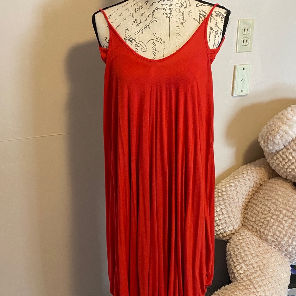 Jumper! Or swim cover! Coral colored